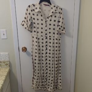 Stylish Black and Cream Checkered Dress